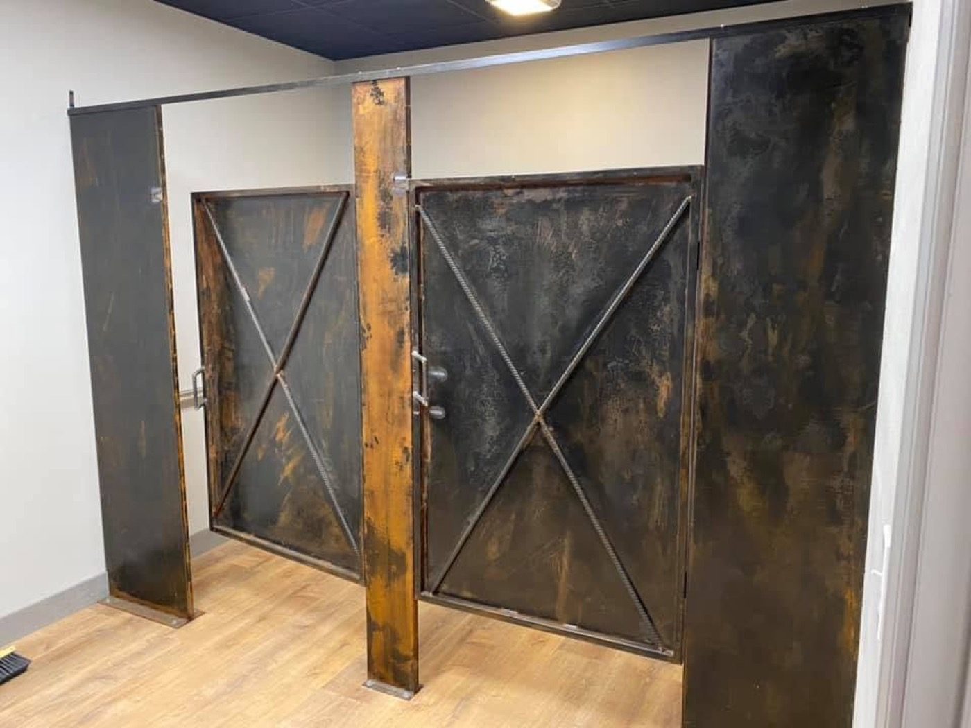 Hand-built steel detailing inside the shop